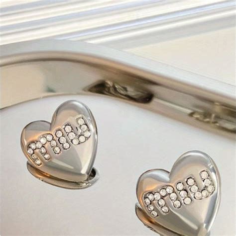 miu miu heart earrings|farfetch miu mia earrings.